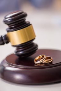 Family Lawyer - Judge gavel deciding on marriage divorce